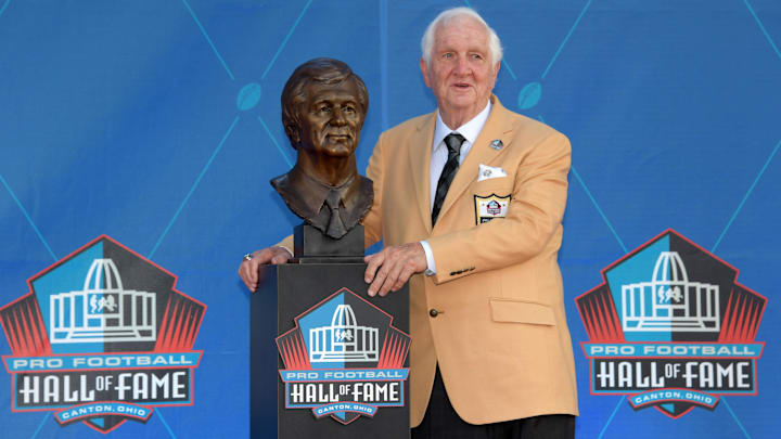 Aug 3, 2019; Canton, OH, USA; Gil Brandt poses with bust during the Pro Football Hall of Fame