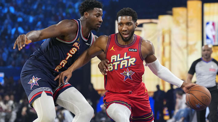 Feb 16, 2025; San Francisco, CA, USA; Chuck’s Global Stars guard Donovan Mitchell (5) of the Cleveland Cavaliers controls the ball against Kenny’s Young Stars forward Jaren Jackson Jr. (13) of the Memphis Grizzlies during the 2025 NBA All Star Game at Chase Center. Mandatory Credit: Kyle Terada-Imagn Images