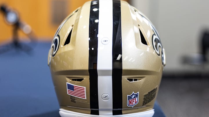 Mar 11, 2023; Metairie, LA, USA;  Detailed view of New Orleans Saints helmet at Ochsner Sports Performance Center. Mandatory Credit: Stephen Lew-Imagn Images