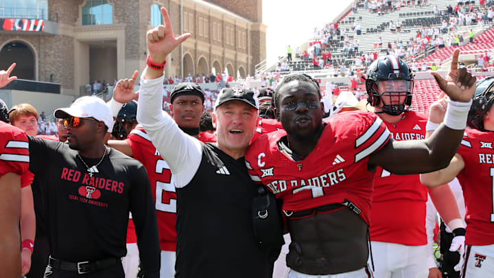 Sep 14, 2024; Lubbock, Texas, USA;  Texas Tech Red Raiders head coach Joey McGuire and defensive back Bryce Ramirez (3) react after a game against the North Texas Mean Green at Jones AT&T Stadium and Cody Campbell Field. Mandatory Credit: Michael C. Johnson-Imagn Images
