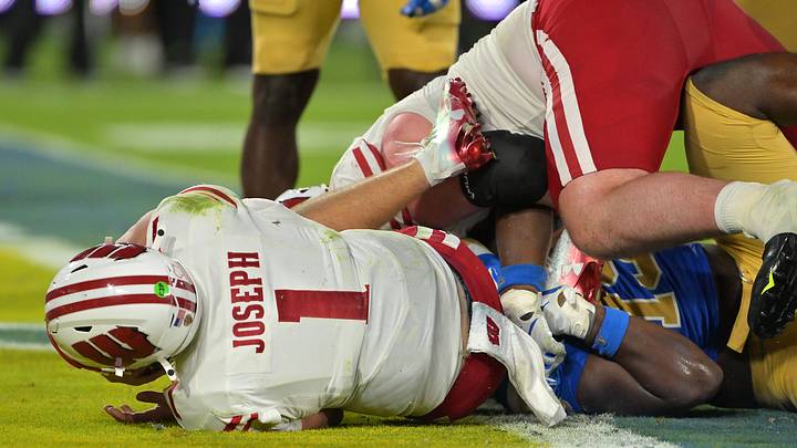 Oct 17, 2026; Pasadena, California, USA; Wisconsin Badgers quarterback Colton Joseph (1) scores a touchdown in the second half against the UCLA Bruins at the Rose Bowl. Mandatory Credit: Jayne Kamin-Oncea-Imagn Images Oct 17, 2026; Pasadena, California, USA; Wisconsin Badgers quarterback Colton Joseph (1) scores a touchdown in the second half against the UCLA Bruins at the Rose Bowl. Mandatory Credit: Jayne Kamin-Oncea-Imagn Images