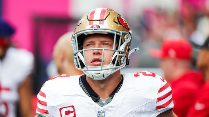 Sep 7, 2025; Seattle, Washington, USA; San Francisco 49ers running back Christian McCaffrey (23) stands on the sideline during the first quarter against the Seattle Seahawks at Lumen Field. Mandatory Credit: Joe Nicholson-Imagn Images