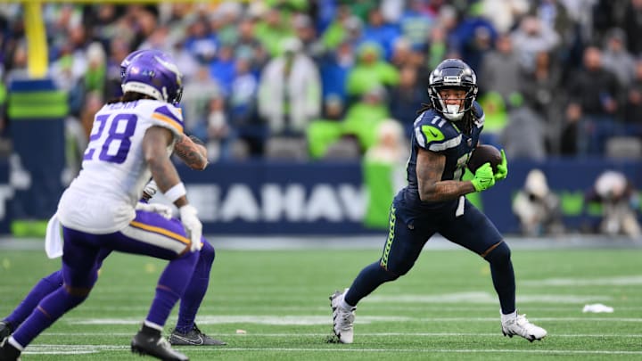 Dec 22, 2024; Seattle, Washington, USA; Seattle Seahawks wide receiver Jaxon Smith-Njigba (11) carries the ball after a catch against the Minnesota Vikings during the second half at Lumen Field. Mandatory Credit: Steven Bisig-Imagn Images Dec 22, 2024; Seattle, Washington, USA; Seattle Seahawks wide receiver Jaxon Smith-Njigba (11) carries the ball after a catch against the Minnesota Vikings during the second half at Lumen Field. Mandatory Credit: Steven Bisig-Imagn Images