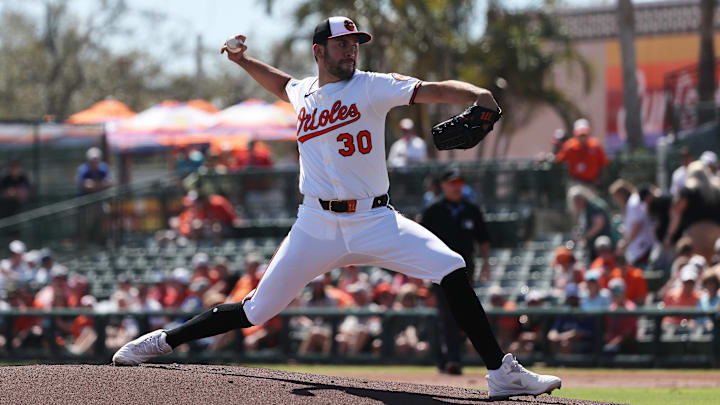 Feb 27, 2025; Sarasota, Florida, USA; Baltimore Orioles starting pitcher Grayson Rodriguez (30) throws a pitch during the first inning against the Toronto Blue Jays at Ed Smith Stadium.