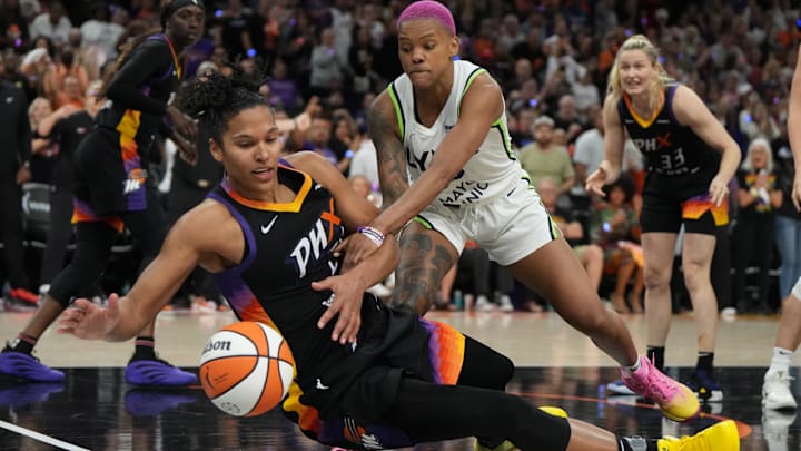 Sep 26, 2025; Phoenix, Arizona, USA; Minnesota Lynx guard Courtney Williams (10) and Phoenix Mercury forward Alyssa Thomas (25) battle for the loose ball during game three of the second round for the 2025 WNBA Playoffs at PHX Arena. Mandatory Credit: Rick Scuteri-Imagn Images Sep 26, 2025; Phoenix, Arizona, USA; Minnesota Lynx guard Courtney Williams (10) and Phoenix Mercury forward Alyssa Thomas (25) battle for the loose ball during game three of the second round for the 2025 WNBA Playoffs at PHX Arena. Mandatory Credit: Rick Scuteri-Imagn Images