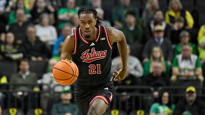 Mar 4, 2025; Eugene, Oregon, USA; Indiana Hoosiers forward Mackenzie Mgbako (21) dribbles the ball against the Oregon Ducks during the second half at Matthew Knight Arena. Mandatory Credit: Craig Strobeck-Imagn Images Mar 4, 2025; Eugene, Oregon, USA; Indiana Hoosiers forward Mackenzie Mgbako (21) dribbles the ball against the Oregon Ducks during the second half at Matthew Knight Arena. Mandatory Credit: Craig Strobeck-Imagn Images