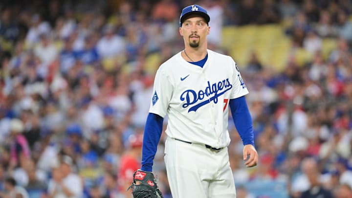 Sep 30, 2025; Los Angeles, California, USA; Los Angeles Dodgers starting pitcher Blake Snell (7) walks off the mound during the second inning against the Cincinnati Reds during game one of the Wildcard round for the 2025 MLB playoffs at Dodger Stadium. Mandatory Credit: Jayne Kamin-Oncea-Imagn Images