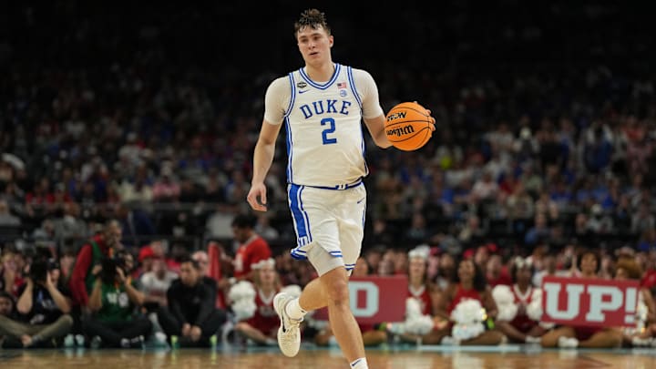 Apr 5, 2025; San Antonio, TX, USA; Duke Blue Devils forward Cooper Flagg (2) dribbles the ball against the Houston Cougars during the second half in the semifinals of the men's Final Four of the 2025 NCAA Tournament at the Alamodome. Mandatory Credit: Bob Donnan-Imagn Images