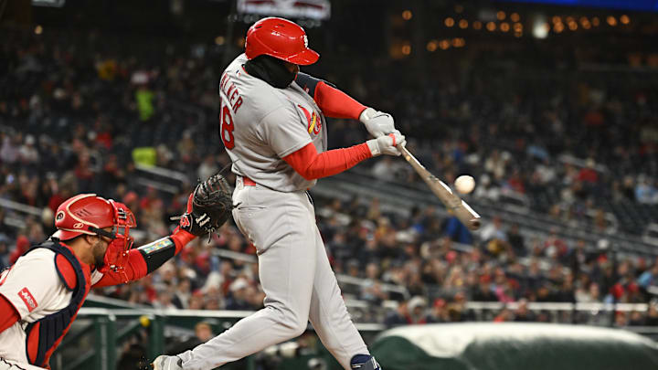 Apr 7, 2026; Washington, District of Columbia, USA; St. Louis Cardinals right fielder Jordan Walker (18) hits the ball into play against the Washington Nationals during the fifth inning at Nationals Park. Mandatory Credit: Rafael Suanes-Imagn Images