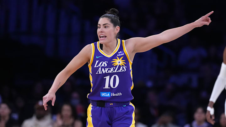 May 23, 2025; Los Angeles, California, USA; LA Sparks guard Kelsey Plum (10) reacts against the Golden State Valkyries in the first half at Crypto.com Arena. Mandatory Credit: Kirby Lee-Imagn Images