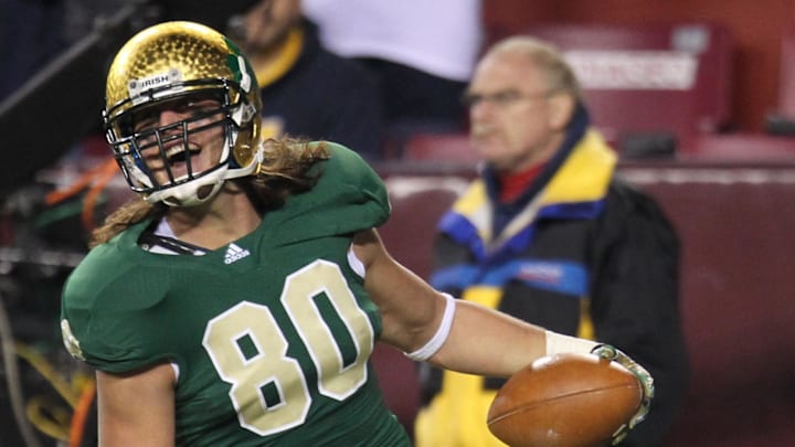 November 12, 2011; College Park, MD, USA;  Notre Dame Fighting Irish tight end Tyler Eifert (80) celebrates his second half touchdown catch and run against the Maryland Terrapins at FedEx Field. Mandatory Credit: Mitch Stringer-Imagn Images