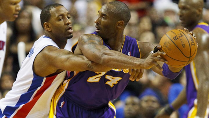 Nov 17, 2010; Auburn Hills, MI, USA; Los Angeles Lakers shooting guard Kobe Bryant (24) is defended by Detroit Pistons shooting guard Tracy McGrady (1) during the game at The Palace. The Lakers defeated the Pistons 103-90. Mandatory Credit: Rick Osentoski-Imagn Images Nov 17, 2010; Auburn Hills, MI, USA; Los Angeles Lakers shooting guard Kobe Bryant (24) is defended by Detroit Pistons shooting guard Tracy McGrady (1) during the game at The Palace. The Lakers defeated the Pistons 103-90. Mandatory Credit: Rick Osentoski-Imagn Images