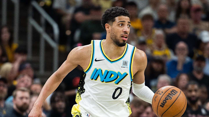 May 11, 2025; Indianapolis, Indiana, USA; Indiana Pacers guard Tyrese Haliburton (0) dribbles the ball during game four of the second round for the 2025 NBA Playoffs against the Cleveland Cavaliers at Gainbridge Fieldhouse. Mandatory Credit: Trevor Ruszkowski-Imagn Images