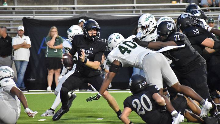 Guyer's Carter Morgan looks to evade the rush during a recent ballgame against Waxahachie. Guyer's Carter Morgan looks to evade the rush during a recent ballgame against Waxahachie.