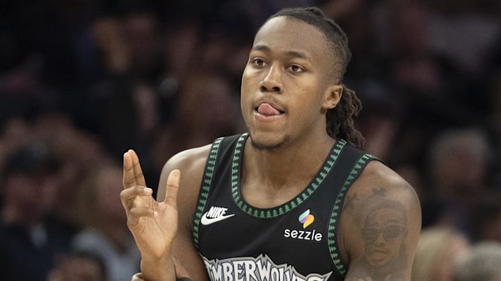 Mar 5, 2026; Minneapolis, Minnesota, USA; Minnesota Timberwolves guard Ayo Dosunmu (13) celebrates making a shot against the Toronto Raptors in the second half at Target Center. Mandatory Credit: Jesse Johnson-Imagn Images