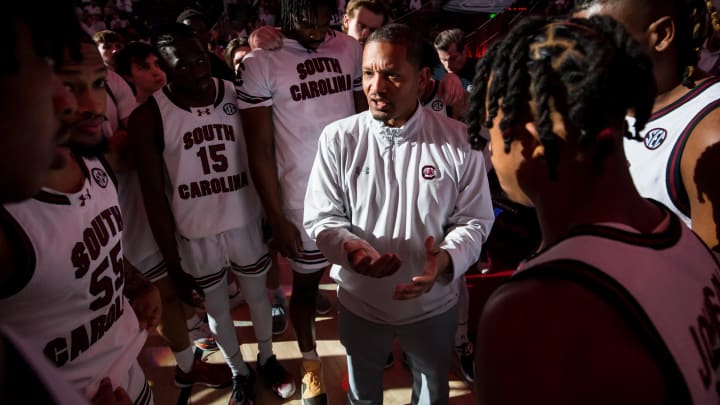 Feb 6, 2024; Columbia, South Carolina, USA;  South Carolina Gamecocks head coach Lamont Paris huddles with his team before their game against the Mississippi Rebels at Colonial Life Arena. Mandatory Credit: Jeff Blake-USA TODAY Sports