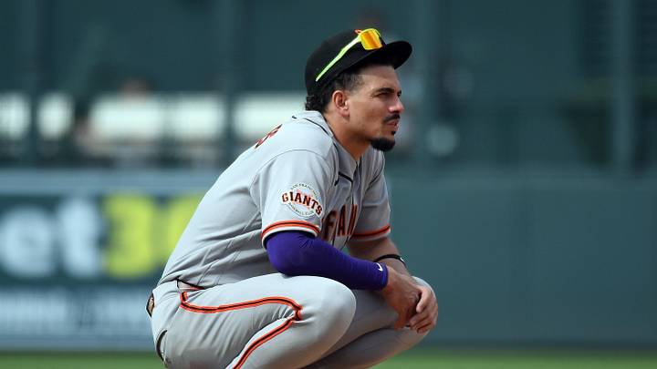 Denver, Colorado, USA; San Francisco Giants infielder Willy Adames (2) waits through a pitching change in the eighth inning against the Colorado Rockies at Coors Field. Mandatory Credit: Christopher Hanewinckel-Imagn Images