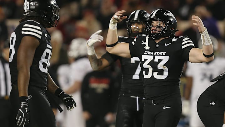 Iowa State linebacker Jack Sadowsky V (33) celebrates with teammates during a win over Cincinnati Saturday night.
