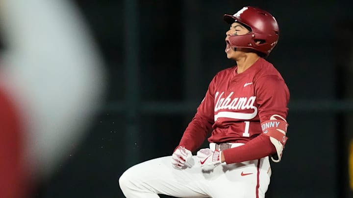 Mar 20, 2025; Tuscaloosa AL, USA; Alabama shortstop Justin Lebron (1) celebrates at second after connecting for a three-run double against Tennessee at Sewell-Thomas Stadium.