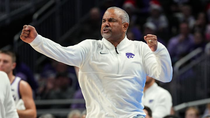 Dec 17, 2024; Kansas City, Missouri, USA; Kansas State Wildcats head coach Jerome Tang reacts during the second half against the Drake Bulldogs at T-Mobile Center. Mandatory Credit: Jay Biggerstaff-Imagn Images