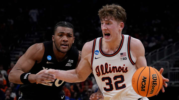 Illinois guard Kasparas Jakucionis (32) drives up to the basket as Xavier guard Dayvion McKnight (20) attempts to guard him during the second half of their first round NCAA men’ s basketball tournament game on Friday March 21, 2025 at Fiserv Forum in Milwaukee, Wis. Illinois guard Kasparas Jakucionis (32) drives up to the basket as Xavier guard Dayvion McKnight (20) attempts to guard him during the second half of their first round NCAA men’ s basketball tournament game on Friday March 21, 2025 at Fiserv Forum in Milwaukee, Wis.