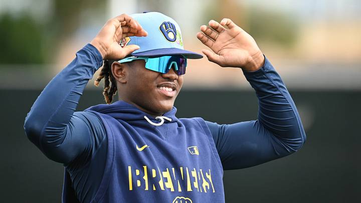Milwaukee Brewers infielder Jesús Made (86) stretches during spring training workouts Monday, February 16, 2026, at American Family Fields of Phoenix in Phoenix, Arizona.
