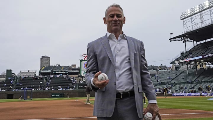 Apr 4, 2025; Chicago, Illinois, USA; Jed Hoyer President of the Chicago Cubs prepares to throw balls to fans before a game against the San Diego Padres at Wrigley Field. Apr 4, 2025; Chicago, Illinois, USA; Jed Hoyer President of the Chicago Cubs prepares to throw balls to fans before a game against the San Diego Padres at Wrigley Field.
