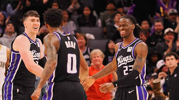 Feb 8, 2025; Sacramento, California, USA; Sacramento Kings forward Jake LaRavia (33), guard Malik Monk (0) and guard Keon Ellis (23) celebrate after a play against the New Orleans Pelicans during the fourth quarter at Golden 1 Center. Mandatory Credit: Kelley L Cox-Imagn Images Feb 8, 2025; Sacramento, California, USA; Sacramento Kings forward Jake LaRavia (33), guard Malik Monk (0) and guard Keon Ellis (23) celebrate after a play against the New Orleans Pelicans during the fourth quarter at Golden 1 Center. Mandatory Credit: Kelley L Cox-Imagn Images