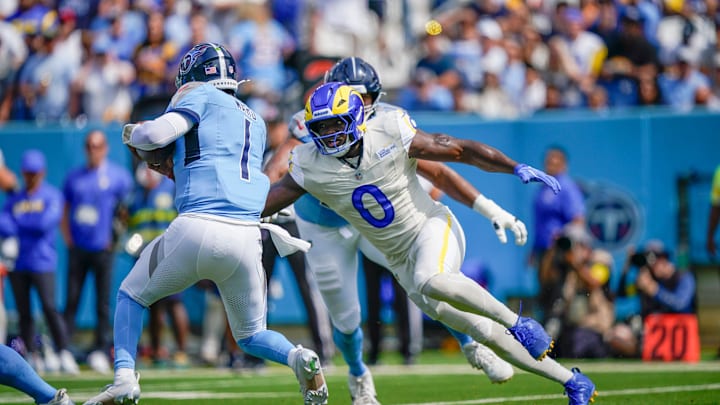 Tennessee Titans quarterback Cam Ward (1) is sacked by Los Angeles Rams linebacker Byron Young (0) during the first quarter at Niss Tennessee Titans quarterback Cam Ward (1) is sacked by Los Angeles Rams linebacker Byron Young (0) during the first quarter at Niss