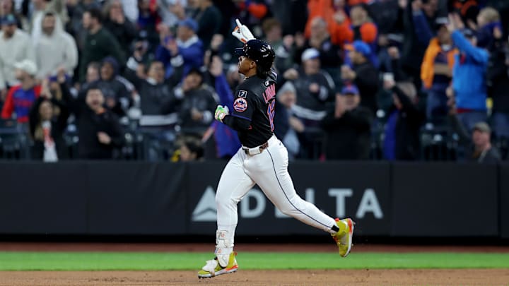 May 9, 2025; New York City, New York, USA; New York Mets shortstop Francisco Lindor (12) reacts as he rounds the bases after hitting a solo home run against the Chicago Cubs during the first inning at Citi Field. Mandatory Credit: Brad Penner-Imagn Images
