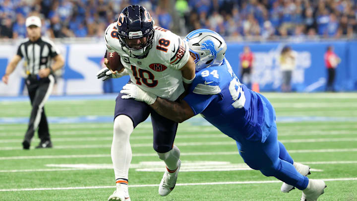 Sep 14, 2025; Detroit, Michigan, USA; Detroit Lions defensive tackle Mekhi Wingo (94) tackles Chicago Bears quarterback Caleb Williams (18) during the second quarter of the game at Ford Field. Mandatory Credit: David Reginek-Imagn Images Sep 14, 2025; Detroit, Michigan, USA; Detroit Lions defensive tackle Mekhi Wingo (94) tackles Chicago Bears quarterback Caleb Williams (18) during the second quarter of the game at Ford Field. Mandatory Credit: David Reginek-Imagn Images