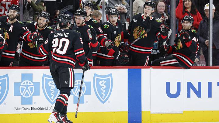 Jan 23, 2026; Chicago, Illinois, USA; Chicago Blackhawks center Ryan Greene (20) celebrates with teammates after scoring against the Tampa Bay Lightning during the first period at United Center. Mandatory Credit: Kamil Krzaczynski-Imagn Images