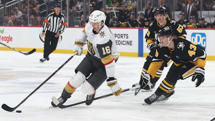 Mar 11, 2025; Pittsburgh, Pennsylvania, USA;  Vegas Golden Knights left wing Pavel Dorofeyev (16) moves the puck against Pittsburgh Penguins left wing Danton Heinen (43) during the second period at PPG Paints Arena. Mandatory Credit: Charles LeClaire-Imagn Images