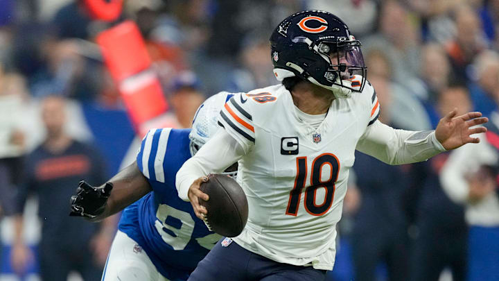 Indianapolis Colts defensive end Tyquan Lewis (94) chases after Chicago Bears quarterback Caleb Williams (18) on Sunday, Sept. 22, 2024, during a game against the Chicago Bears at Lucas Oil Stadium in Indianapolis. Indianapolis Colts defensive end Tyquan Lewis (94) chases after Chicago Bears quarterback Caleb Williams (18) on Sunday, Sept. 22, 2024, during a game against the Chicago Bears at Lucas Oil Stadium in Indianapolis.