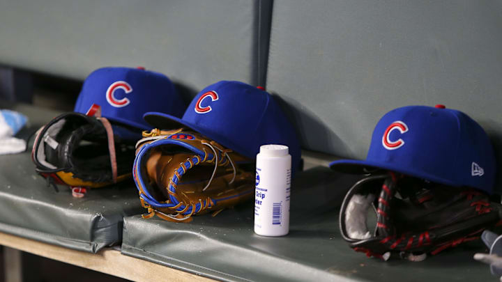 Apr 3, 2019; Atlanta, GA, USA; Detailed view of Chicago Cubs hats and gloves in the dugout against the Atlanta Braves in the fifth inning at SunTrust Park. Mandatory Credit: Brett Davis-Imagn Images
Apr 3, 2019; Atlanta, GA, USA; Detailed view of Chicago Cubs hats and gloves in the dugout against the Atlanta Braves in the fifth inning at SunTrust Park. Mandatory Credit: Brett Davis-Imagn Images