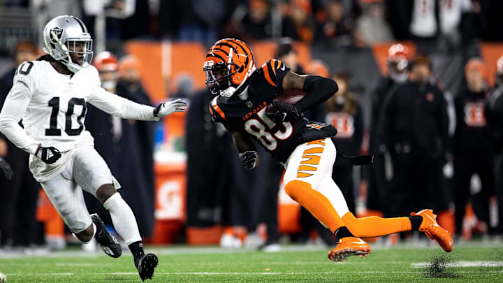 Cincinnati Bengals wide receiver Tee Higgins (85) runs downfield as Las Vegas Raiders cornerback Desmond Trufant (10) goes to tackle him after he got a first down in the second half the AFC wild card game on Saturday, Jan. 15, 2022, at Paul Brown Stadium in Cincinnati. Cincinnati Bengals defeated Las Vegas Raiders 26-19.
Las Vegas Raiders At Cincinnati Bengals Playoff Ac 201 Cincinnati Bengals wide receiver Tee Higgins (85) runs downfield as Las Vegas Raiders cornerback Desmond Trufant (10) goes to tackle him after he got a first down in the second half the AFC wild card game on Saturday, Jan. 15, 2022, at Paul Brown Stadium in Cincinnati. Cincinnati Bengals defeated Las Vegas Raiders 26-19.
Las Vegas Raiders At Cincinnati Bengals Playoff Ac 201