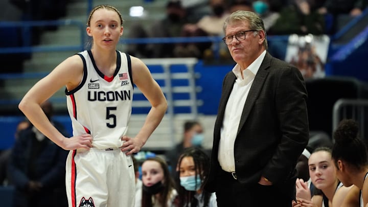 Feb 25, 2022; Hartford, Connecticut, USA; UConn Huskies head coach Geno Auriemma talks with guard Paige Bueckers (5) from the sideline as they take on the St. John's Red Storm in the second half at XL Center. Mandatory Credit: David Butler II-Imagn Images Feb 25, 2022; Hartford, Connecticut, USA; UConn Huskies head coach Geno Auriemma talks with guard Paige Bueckers (5) from the sideline as they take on the St. John's Red Storm in the second half at XL Center. Mandatory Credit: David Butler II-Imagn Images
