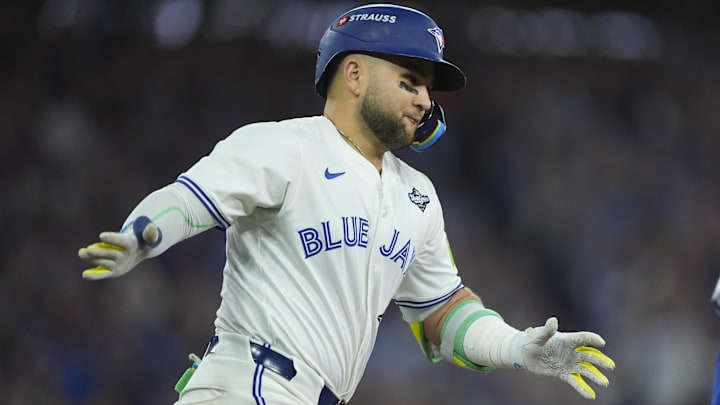 Nov 1, 2025; Toronto, Ontario, CAN; Toronto Blue Jays designated hitter Bo Bichette (11) reacts as he runs the bases after hitting a three run home run against the Los Angeles Dodgers in the third inning during game seven of the 2025 MLB World Series at Rogers Centre. Mandatory Credit: John E. Sokolowski-Imagn Images
