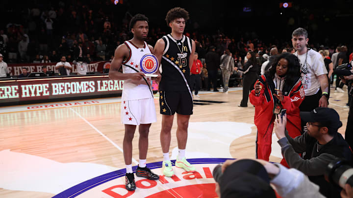 Apr 1, 2025; Brooklyn, NY, USA; McDonald's All American West guard Darryn Peterson (22) and McDonald's All American East forward Cameron Boozer (12) pose for photos after the game at Barclays Center. Mandatory Credit: Pamela Smith-Imagn Images