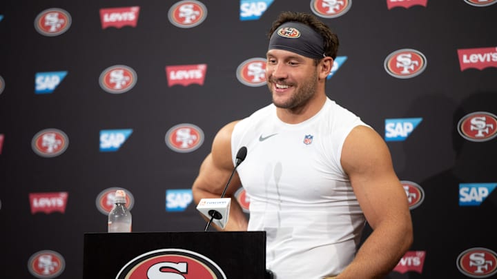 Jul 23, 2025; Santa Clara, CA, USA; San Francisco 49ers defensive end Nick Bosa answers questions from reporters following the first day of training camp at SAP Performance Facility. Mandatory Credit: D. Ross Cameron-Imagn Images