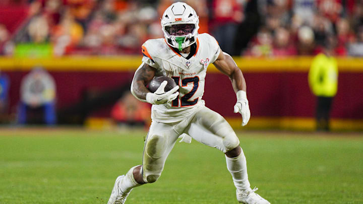 Dec 25, 2025; Kansas City, Missouri, USA; Denver Broncos running back RJ Harvey (12) runs with the ball during the second half against the Kansas City Chiefs at GEHA Field at Arrowhead Stadium. Mandatory Credit: Jay Biggerstaff-Imagn Images Dec 25, 2025; Kansas City, Missouri, USA; Denver Broncos running back RJ Harvey (12) runs with the ball during the second half against the Kansas City Chiefs at GEHA Field at Arrowhead Stadium. Mandatory Credit: Jay Biggerstaff-Imagn Images