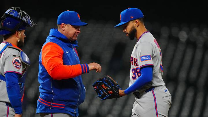May 6, 2026; Denver, Colorado, USA; New York Mets manager Carlos Mendoza (64) and relief pitcher Devin Williams (38) on the mound during the ninth inning against the Colorado Rockies at Coors Field. Mandatory Credit: Ron Chenoy-Imagn Images May 6, 2026; Denver, Colorado, USA; New York Mets manager Carlos Mendoza (64) and relief pitcher Devin Williams (38) on the mound during the ninth inning against the Colorado Rockies at Coors Field. Mandatory Credit: Ron Chenoy-Imagn Images