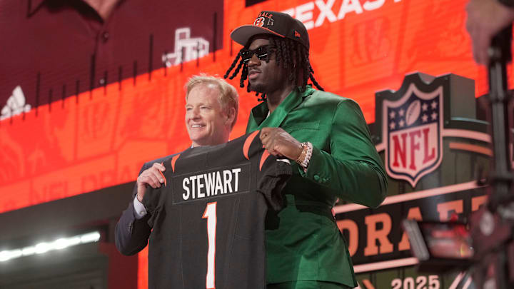 Texas A&M Aggies defensive end Shemar Stewart poses with NFL commissioner Roger Goodell poses after being selected by the Cincinnati Bengals as the number seventeen pick in the first round of the 2025 NFL Draft at Lambeau Field.