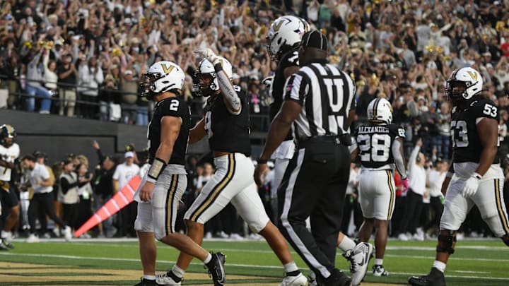 Oct 25, 2025; Nashville, Tennessee, USA; Vanderbilt Commodores quarterback Diego Pavia (2) celebrates his one-yard touchdown run against the Missouri Tigers during the fourth quarter at FirstBank Stadium.  Oct 25, 2025; Nashville, Tennessee, USA; Vanderbilt Commodores quarterback Diego Pavia (2) celebrates his one-yard touchdown run against the Missouri Tigers during the fourth quarter at FirstBank Stadium.