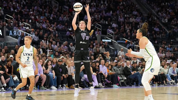 Jun 1, 2025; San Francisco, California, USA; Golden State Valkyries guard Kate Martin (20) shoots against Minnesota Lynx guards Natisha Hiedeman (2) and Kayla McBride (right) during the fourth quarter at Chase Center. Mandatory Credit: Darren Yamashita-Imagn Images 