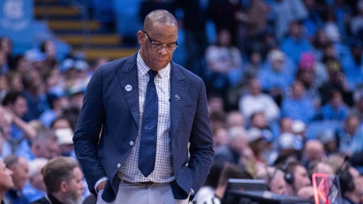 Dec 16, 2025; Chapel Hill, North Carolina, USA; North Carolina Tar Heels head coach Hubert Davis walks the sideline during the first half against the ETSU Buccaneers at Dean E. Smith Center. Mandatory Credit: Scott Kinser-Imagn Images