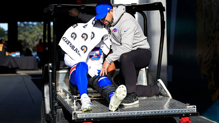 Buffalo Bills wide receiver Gabe Davis (13) is carted off after an apparent injury during the fourth quarter of an NFL football AFC Wild Card playoff matchup, Sunday, Jan. 11, 2026, in Jacksonville, Fla. The Bills defeated the Jaguars 27-24. 