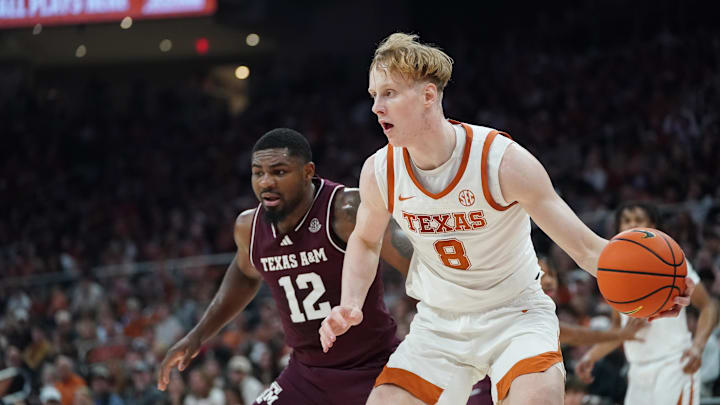 Texas Longhorns center Matas Vokietaitis moves against Texas A&M Aggies forward Rashaun Agee during the first half at Moody Center. 