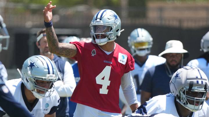 Dallas Cowboys quarterback Dak Prescott takes the snap at training camp at River Ridge Playing Fields. Dallas Cowboys quarterback Dak Prescott takes the snap at training camp at River Ridge Playing Fields.