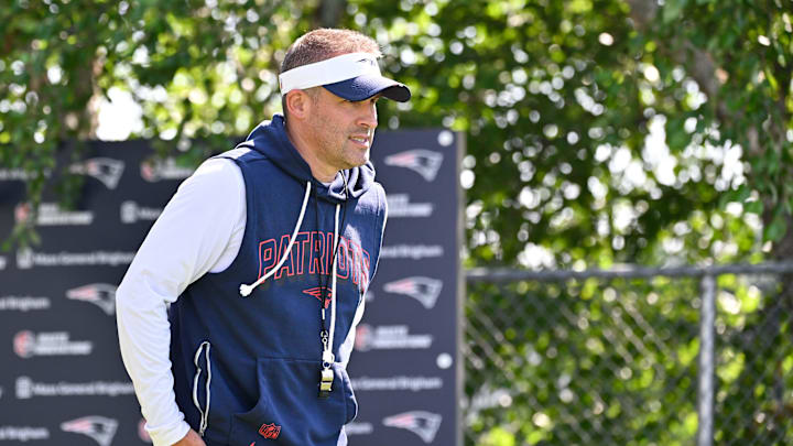 Jul 28, 2025; Foxborough, MA, USA; New England Patriots offensive coordinator Josh McDaniels heads to the practice fields for training camp at Gillette Stadium. Mandatory Credit: Eric Canha-Imagn Images Jul 28, 2025; Foxborough, MA, USA; New England Patriots offensive coordinator Josh McDaniels heads to the practice fields for training camp at Gillette Stadium. Mandatory Credit: Eric Canha-Imagn Images